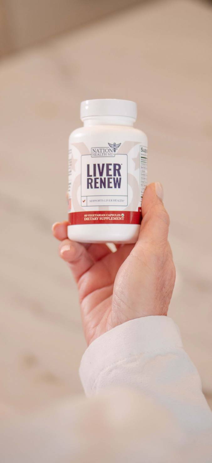 Liver Renew bottle in hand