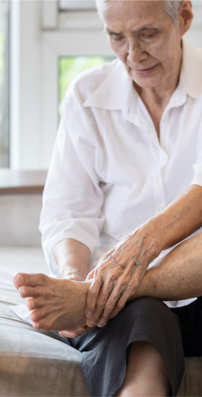 Senior checking feet